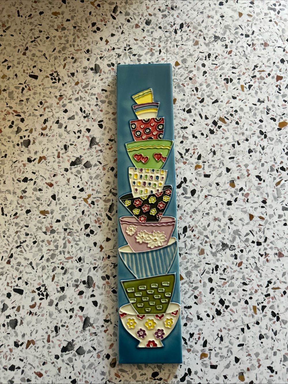 whimsical hand-painted ceramic art tile vertical stack of colorful  bowls.